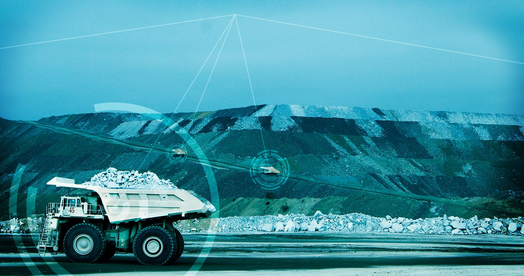 Stylised photo of trucks on a haul ramp sharing information