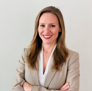 Consumerism & the mining industry: part 1 1 Headshot for Elizabeth Freele. She stands smiling at the camera